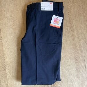 Brand new with tags, men’s slim fit, navy, heat tech Uniqlo pants
